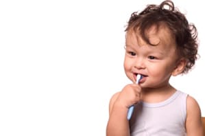 A child brushing her teeth