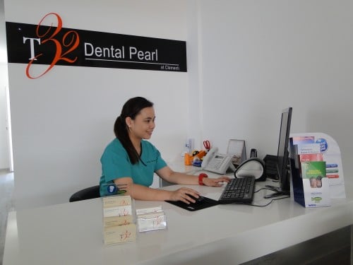 A receptionist in T32 Dental Pearl