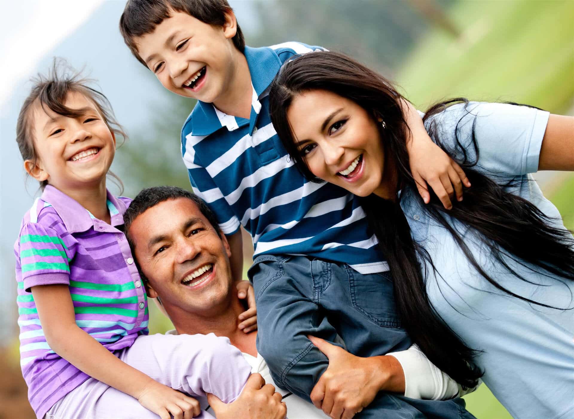 a family smiling for the camera