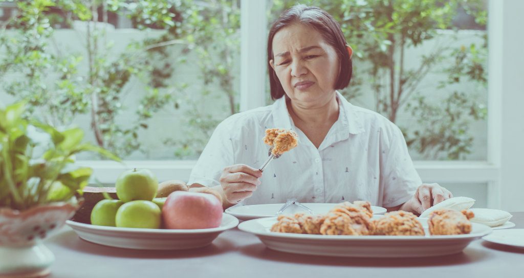 woman upset when eating